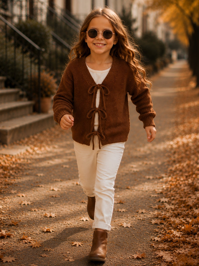 Girls trendy bow cardigan for fall outfits.