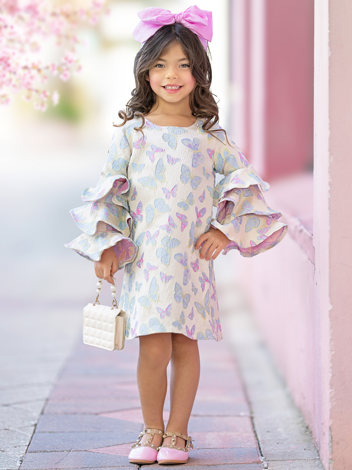 Pastel butterfly print detail on girls spring party dress