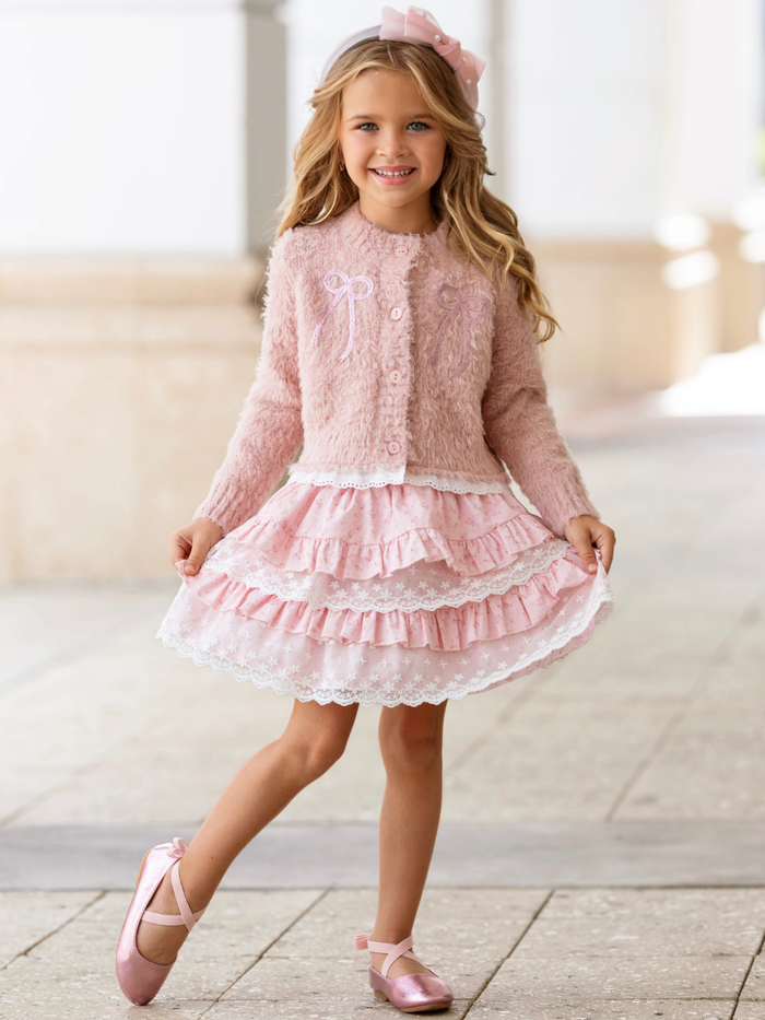 Girls cardigan and lace skirt set featuring embroidered bows and soft knit fabric.
