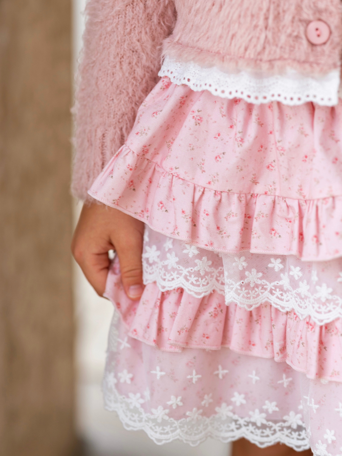 Girls lace skirt set featuring embroidered bows and lace fabric.
