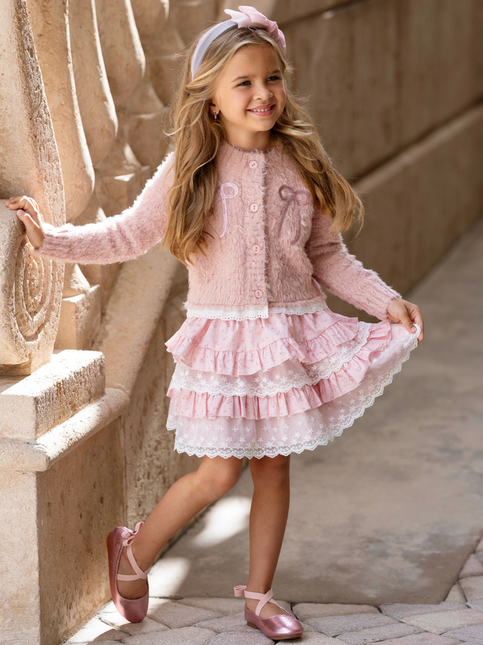 Girls boutique cardigan and lace skirt set featuring embroidered bows and soft knit fabric.
